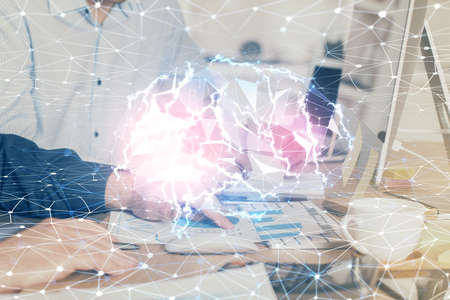 Man with computer background with brain theme hologram. Concept of brainstorm. Double exposure.