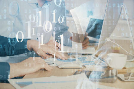 Double exposure of technology hologram with man working on computer background. Concept of big data.