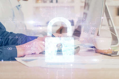 Multi exposure of lock icon with man working on computer on background. Concept of network...