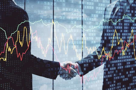 Double exposure of forex graph hologram and handshake of two men. Stock market concept.