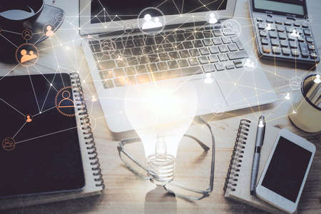 Computer on desktop with social network hologram. Double exposure. Concept of international people...