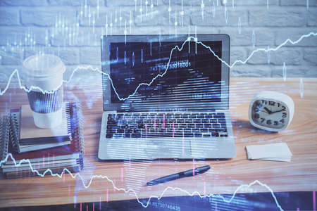 Multi exposure of forex graph and work space with computer. Concept of international online trading.