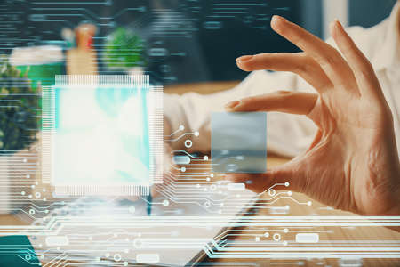 Multi exposure of writing hands on background with data solution hologram. Technology concept.