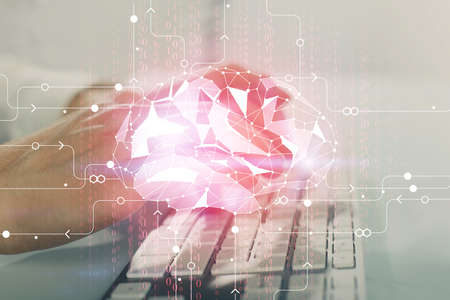 Man with computer background with brain theme hologram. Concept of brainstorm. Double exposure.の写真素材