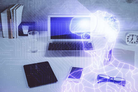 Computer on desktop with AR theme icon. Multi exposure. Concept of augmented reality.