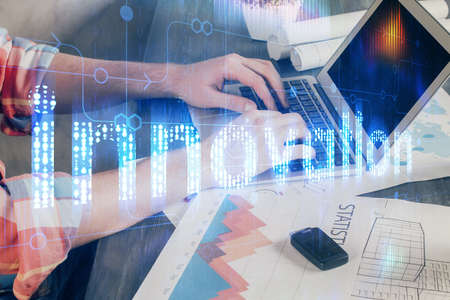 Multi exposure of technology hologram with man working on computer background. Concept of big data.