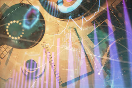 Multi exposure of forex chart drawing and work table top veiw. Concept of financial analysis.