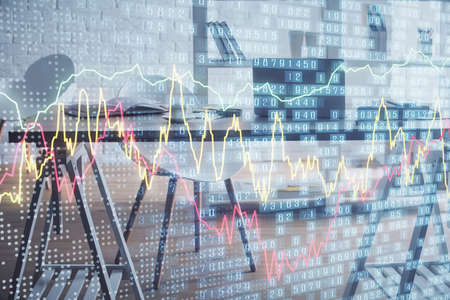 Multi exposure of stock market chart drawing and office interior background. Concept of financial...