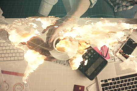 Double exposure of man and woman working together and business theme hologram drawing. Computer...