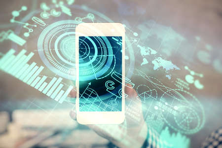 Double exposure of man's hands holding and using a phone and international business theme drawing.