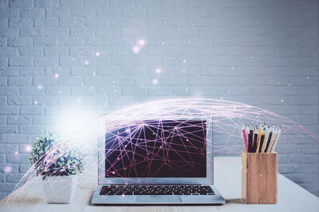 Computer on desktop with social network hologram. Double exposure. Concept of international people connections.の写真素材