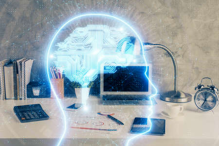 Double exposure of desktop with computer and brain drawing hologram. Artificial intelligence concept.の写真素材