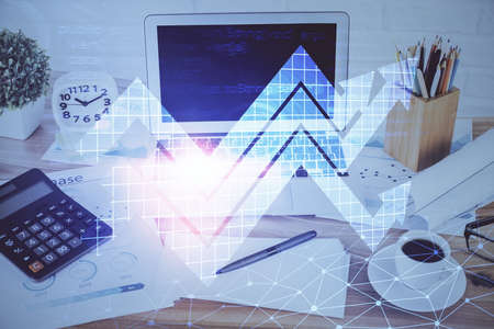 Computer on desktop with point up arrows hologram. Double exposure. Concept of success.