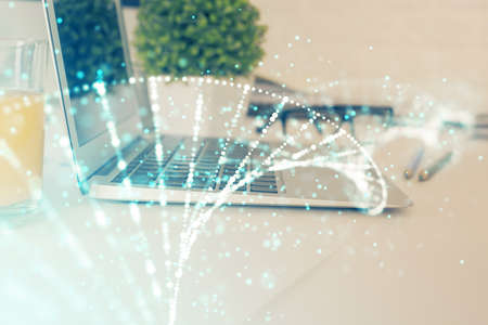 Desktop computer background and DNA drawing. Double exposure. Science concept.の写真素材