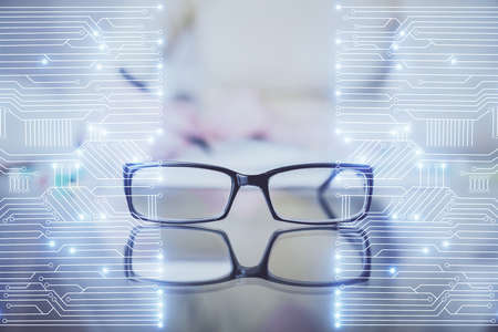 Technology theme hologram over woman's hands taking notes background. Concept of Tech. Double exposureの写真素材