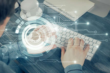 Double exposure of tech drawings with hands working on computer background. Concept of innovation.