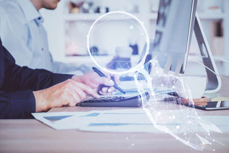 Start up drawings with businessman working on computer on background. Teamwork concept. Double exposure.の写真素材