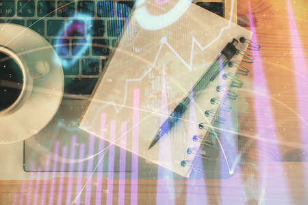 Multi exposure of forex chart drawing and work table top veiw. Concept of financial analysis.の写真素材