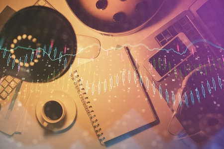 Multi exposure of forex chart drawing and work table top veiw. Concept of financial analysis.の写真素材