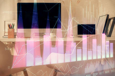 Double exposure of stock market graph drawing and office interior background. Concept of financial...