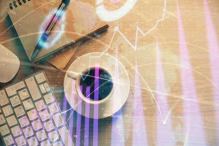 Multi exposure of forex chart drawing and work table top veiw. Concept of financial analysis.