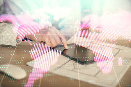 Double exposure of man's hands holding and using a phone and international business theme drawing.