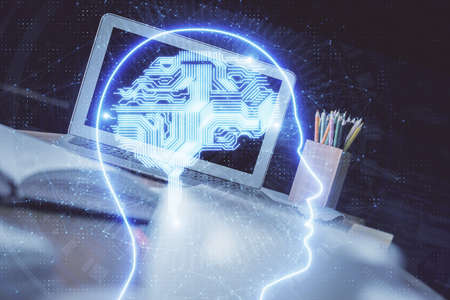 Multi exposure of work space with computer and human brain hologram. Brainstorm concept.