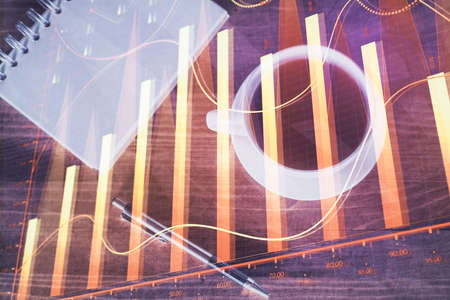 Double exposure of forex graph drawing and work table top veiw. Concept of financial analysis.