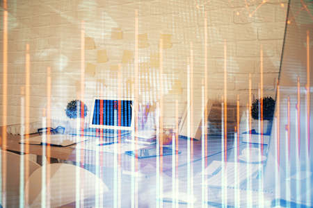 Multi exposure of stock market chart drawing and office interior background. Concept of financial...