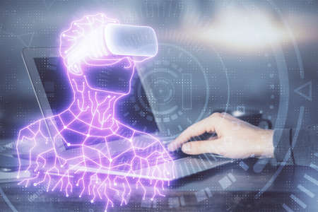 AR hologram with man working on computer on background. Augmented reality concept. Double exposure.