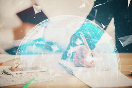 Double exposure of business theme drawing over people taking notes background. Concept of financial worldの写真素材