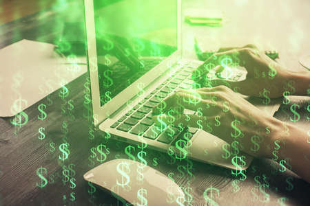 Double exposure of woman hands typing on computer and forex chart hologram drawing. Stock market...