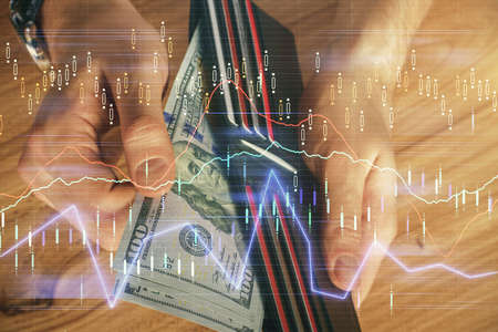 Multi exposure of forex graph drawing hologram and USA dollars bills and man hands. Technical Analysis concept.の写真素材