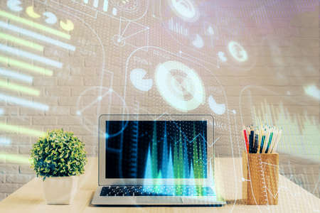Double exposure of table with computer on background and data theme hologram. Data technology concept.の写真素材
