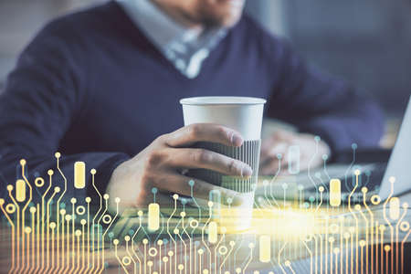 Double exposure of data internet theme hologram with man working on computer on background. Concept...