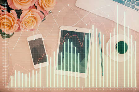 Multi exposure of forex graph hologram over desktop with phone. Top view. Mobile trade platform...