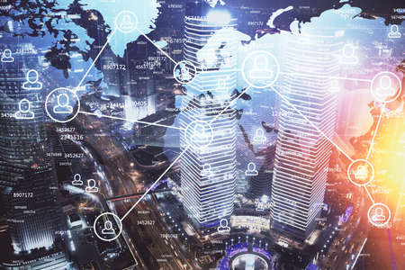 Multi exposure of social network theme drawing and cityscape background. Concept of people connecton.の写真素材