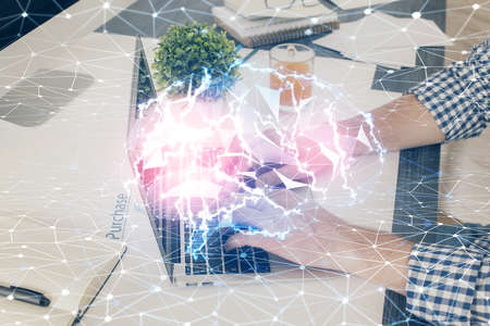 Man with computer background with brain theme hologram. Concept of brainstorm. Double exposure.