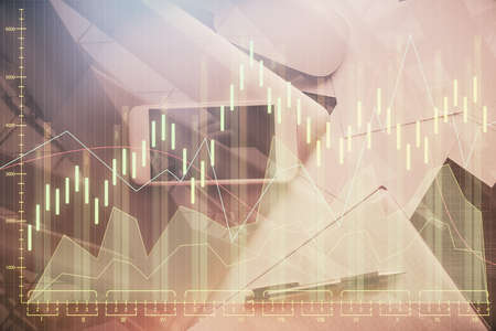 Multi exposure of forex graph hologram over desktop with phone. Top view. Mobile trade platform concept.の写真素材
