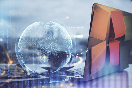 Multi exposure of table with computer and world map hologram. International data network concept.