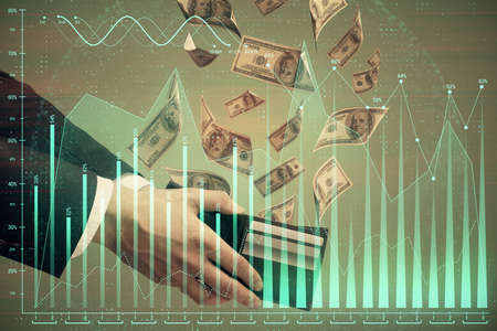 Multi exposure of financial graph drawing hologram and USA dollars bills and man hands. Analysis...