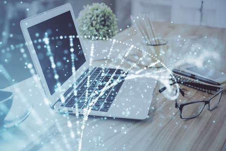 Desktop computer background and DNA drawing. Double exposure. Science concept.