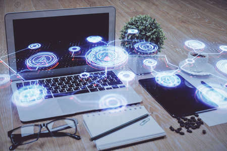 Computer on desktop with social network hologram. Double exposure. Concept of international people...
