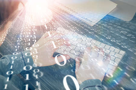 Double exposure of tech drawings with hands working on computer background. Concept of innovation.