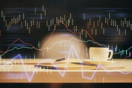 Multi exposure of forex graph drawing and desktop with coffee and items on table background. Concept...