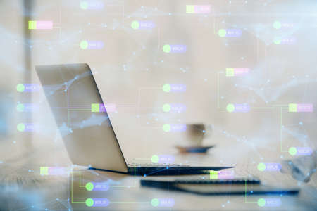 Double exposure of table with computer on background and data theme drawing. Concept of innovation.の写真素材