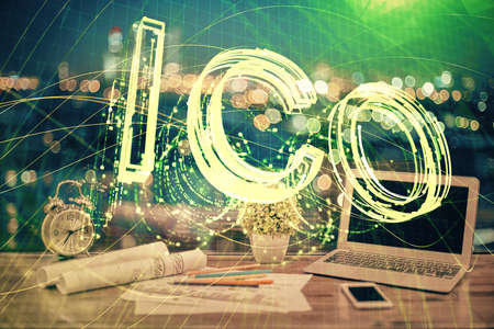 Double exposure of blockchain theme hologram and table with computer background. Concept of bitcoin...