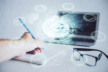 Man's hands working with notes background. Social networking concept. Crowd sourcing. Global...