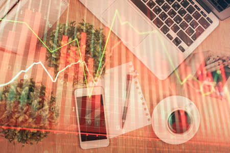 Multi exposure of financial chart hologram over desktop with phone. Top view. Mobile trade platform...