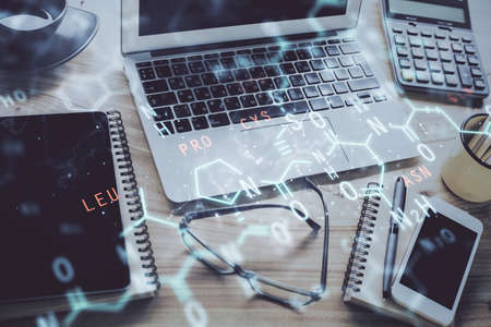 Desktop computer background and formula hologram writing. Double exposure. Education concept.
